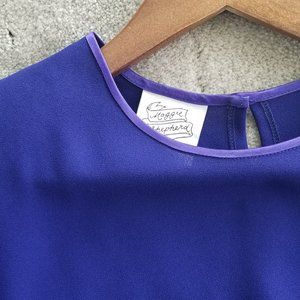 Maggie Shepherd purple top with purple trim
